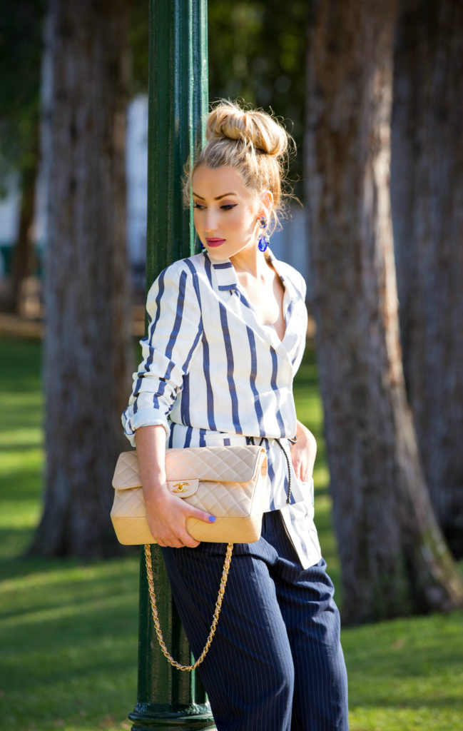 Belting techniques,How to wear Striped Jacket,How to wear stripes,Striped Jacket,bottega veneta belt,Statement earrings with bun,christian louboutin pigalle follies,yellow pumps and Cuffed pants,Messy bun with statement earrings, Statement earrings, change jumbo bag,beige chanel bag, imperfectly perfect bun  