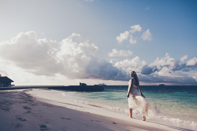 nina ricci ruffle white dress,W Hotel Maldives photo shoot,W hotel Maldives,Dior Bracelet,Nina Ricci dress,destination photography,travel photography,maldives,alaia boots,alaia sandals,alaia lace up,dior jewelry,dior earrings ,dior bracelet