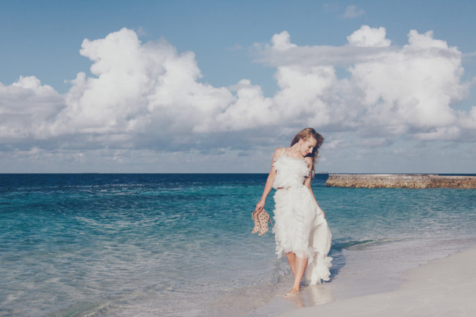 On cloud nine,nina ricci ruffle white dress,W Hotel Maldives photo shoot,W hotel Maldives,Dior Bracelet,Nina Ricci dress,destination photography,travel photography,maldives,alaia boots,alaia sandals,alaia lace up,dior jewelry,dior earrings ,dior bracelet