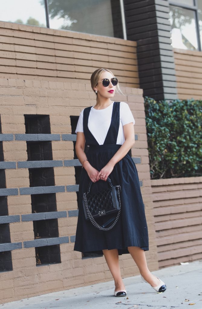 Suspender dress,Urban outfitters apron dress,theory white t-shirt,Urban outfitters suspender dress,Chanel flats,How to style white t-shirt,Chanel chain Boy bag,Chanel pearl flats,pinafore dress,Silence + Noise Camden Apron Midi Skirt,the row 8 sunglasses, miansai 