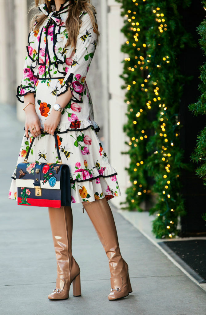 Gucci bow dress,How to wear floral print in winter,Gucci look,Gucci midi dress,Gucci buckle boots and floral bag,Gucci bow,Gucci floral bag,Gucci boots,Gucci cat lock bag and boots,gucci floral bow detail,Gucci lock bag,Gucci dress and boots,Gucci padlock flower bag,Gucci floral dress,Gucci flower dress,Gucci flower print dress,Gucci Christmas loo,Jolly and Bright