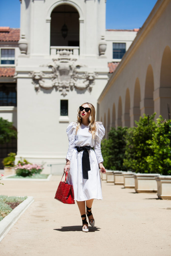 Proenza Schouler cutout mules,Alaia Vienne laser-cut leather tote,how to wear oversized sleeves,Alaïa Vienne tote,summer white outfit,H&M denim skirt,Alaïa Vienne tote bag,Zara BOW STRIPED BLOUSE,Zara STRIPED BLOUSE WITH BOW,Alaïa red Vienne bag,Zara bow top detail,Proenza Schouler strappy mules,Zara puff sleeves blouse,ZARA BOW top,How to wear Voluminous-Sleeve Shirt