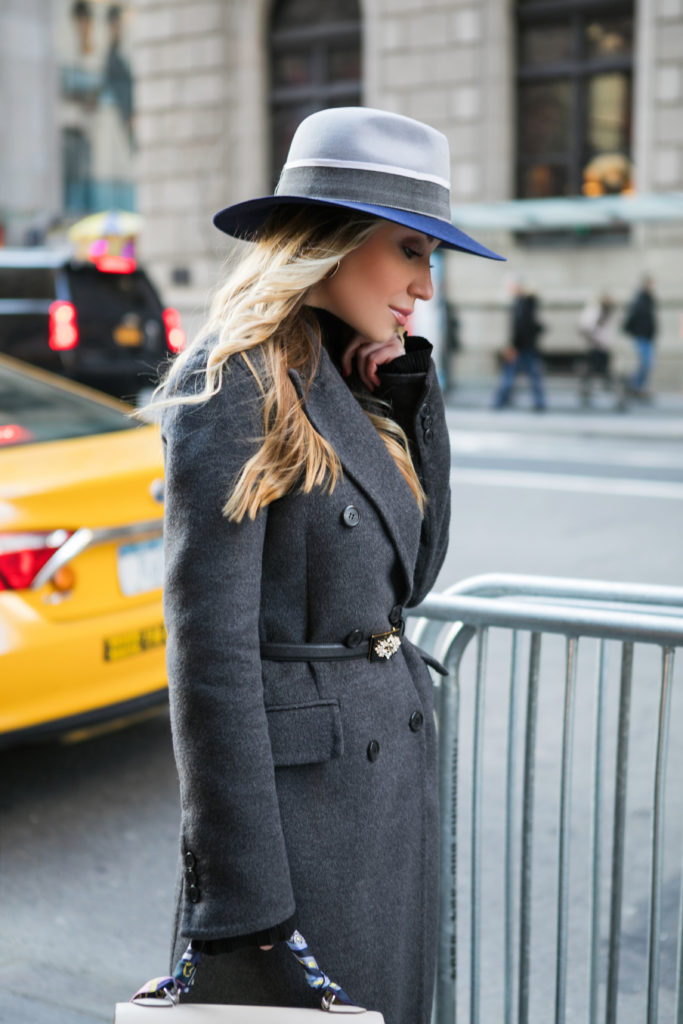 NYC yellow cabs,Prada wool coat,Maison Michel Henrietta rabbit-felt fedora,how to wear red boots,Maison Michel henrietta hat,how to wear coat with a buckle belt,How to style Hermes Kelly bag,Maison Michel Henrietta felt fedora hat,prada coat,how to style red boots,Prada double breasted coat,Alexander McQueen red buckle ankle boots,Alexander McQueen red Leather Ankle Boots,Alexander McQueen Leather Ankle Boots,Prada grey double breasted coat